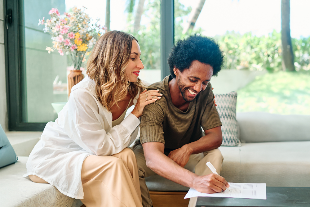 What To Do After Getting Engaged: A Calm, Clear Path Forward Couple Reviewing Plans Together After Getting Engaged, Discussing What To Do After Getting Engaged Calmly And Intentionally.